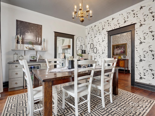 dining room with dark wood finished floors, beverage cooler, a notable chandelier, and crown molding