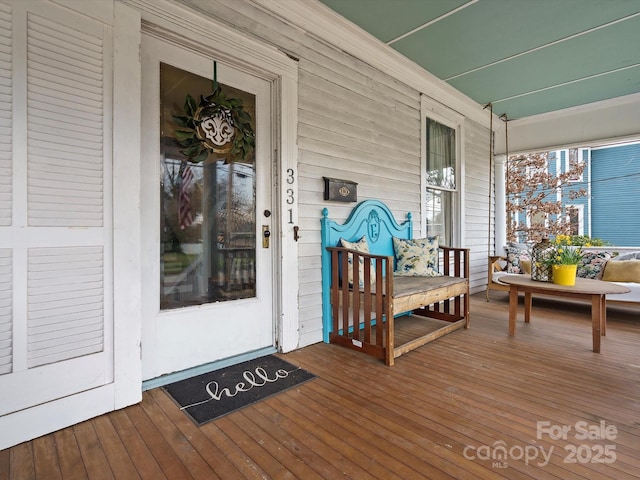 entrance to property with covered porch