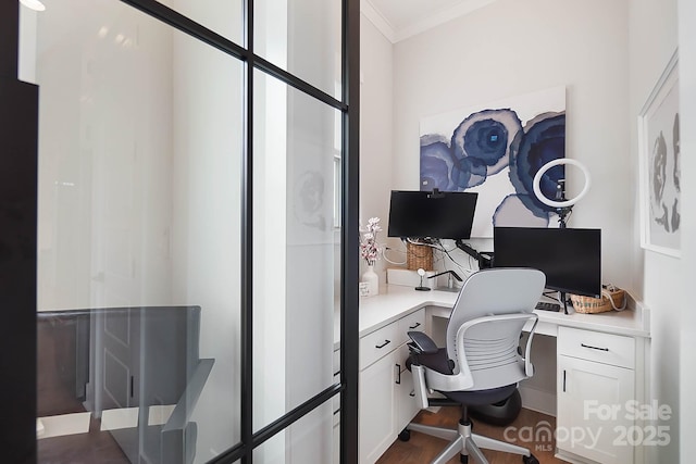 office with ornamental molding and built in desk