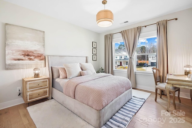 bedroom featuring hardwood / wood-style flooring