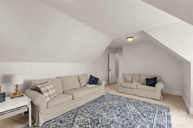 living room featuring lofted ceiling and carpet flooring