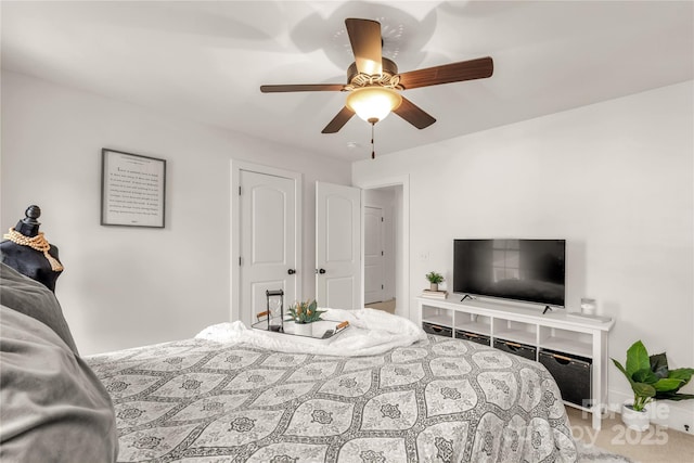 bedroom featuring ceiling fan