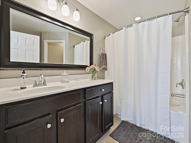 bathroom with vanity and shower / bath combo