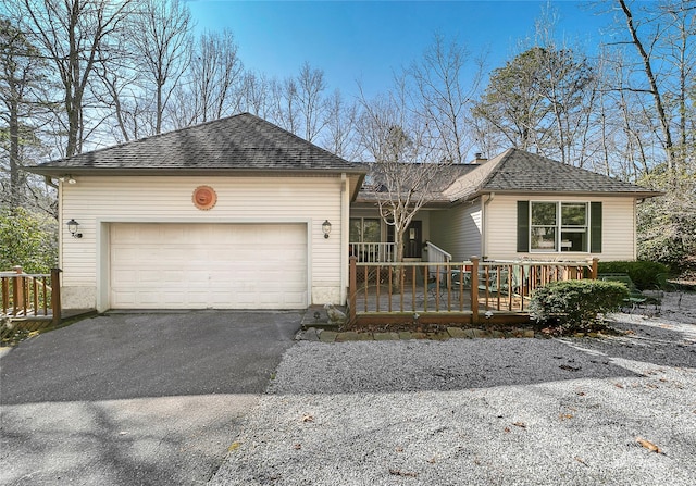 ranch-style house featuring a garage