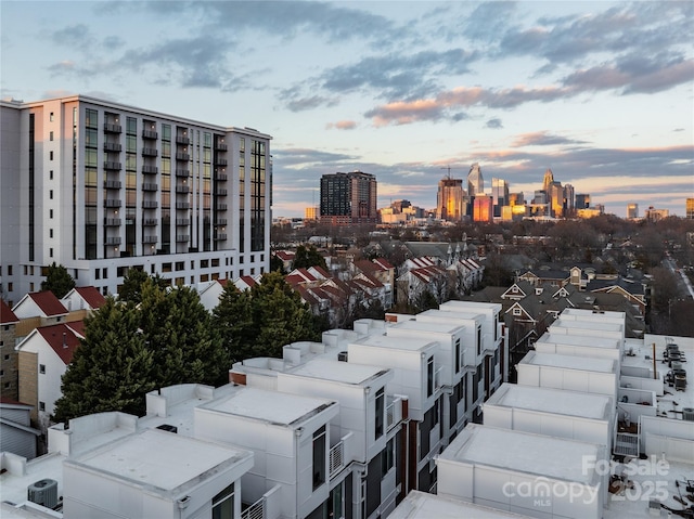 outdoor building at dusk with cooling unit