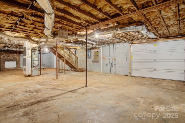 basement with heating unit and electric panel