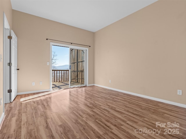 unfurnished room featuring light wood-type flooring