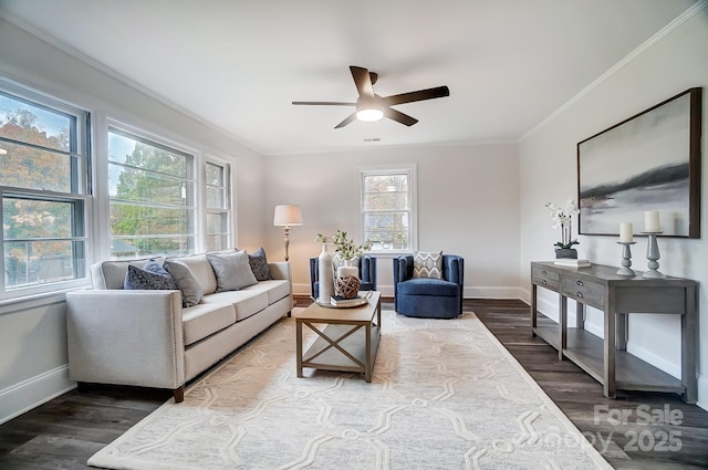 living room featuring crown molding, ceiling fan, and dark hardwood / wood-style floors