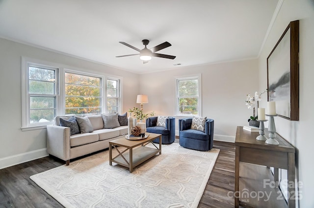 living room featuring crown molding, ceiling fan, and hardwood / wood-style flooring