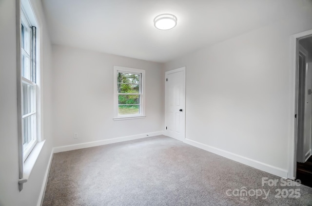 view of carpeted spare room