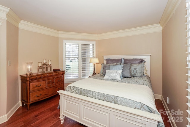 bedroom with crown molding and dark hardwood / wood-style flooring