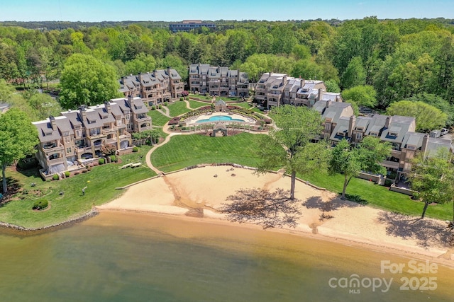 drone / aerial view with a water view