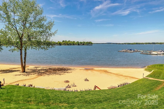 property view of water featuring a view of the beach