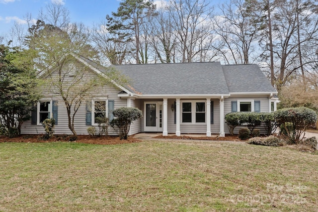 single story home featuring a front yard