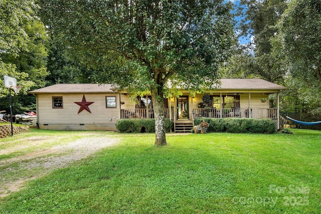 single story home with crawl space, covered porch, driveway, and a front yard