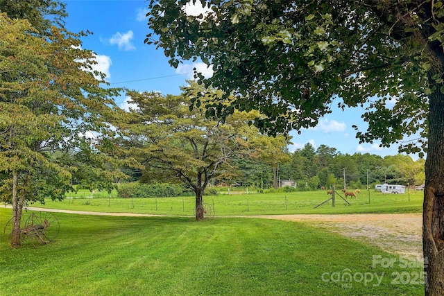 surrounding community with a yard