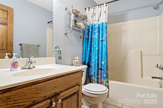 full bath featuring toilet, tile patterned floors, shower / bath combination with curtain, and vanity