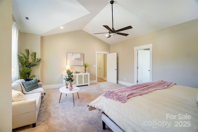 bedroom featuring light carpet, vaulted ceiling, and ceiling fan