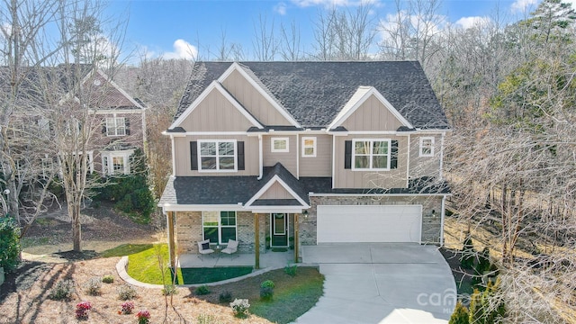 view of front of house featuring a garage and covered porch