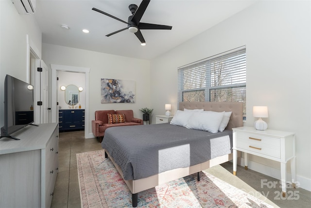 bedroom featuring a wall mounted AC, connected bathroom, and ceiling fan