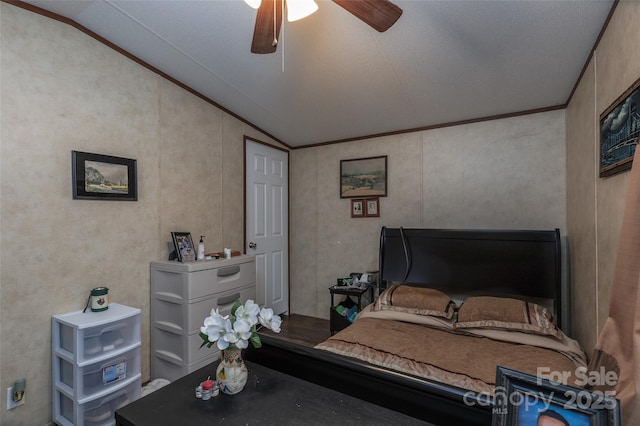 bedroom featuring lofted ceiling and ceiling fan