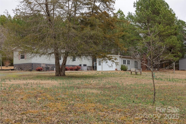 exterior space featuring a front lawn