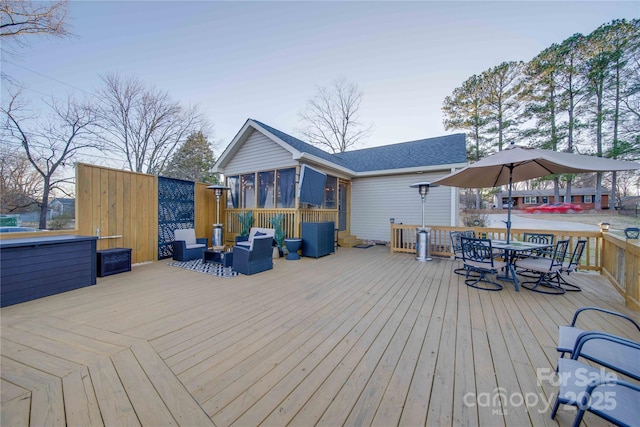 deck with an outdoor hangout area