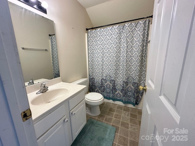 bathroom with toilet, a shower with curtain, tile patterned floors, a textured ceiling, and vanity