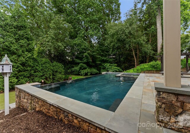 2809 Glendale Rd, Charlotte, NC 28209 - outdoor pool featuring a patio area