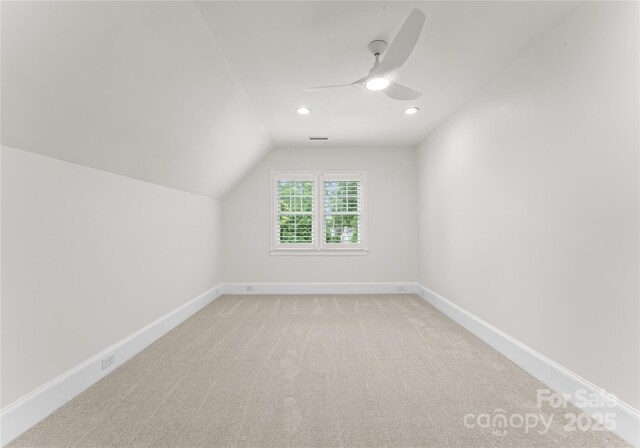 2809 Glendale Rd, Charlotte, NC 28209 - bonus room featuring lofted ceiling, a ceiling fan, baseboards, recessed lighting, and light carpet