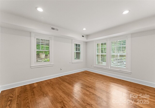 2809 Glendale Rd, Charlotte, NC 28209 - spare room with baseboards, wood finished floors, and recessed lighting