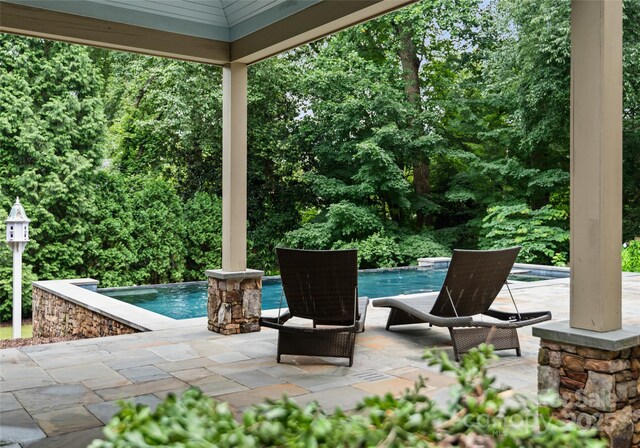 2809 Glendale Rd, Charlotte, NC 28209 - view of patio / terrace with an outdoor pool