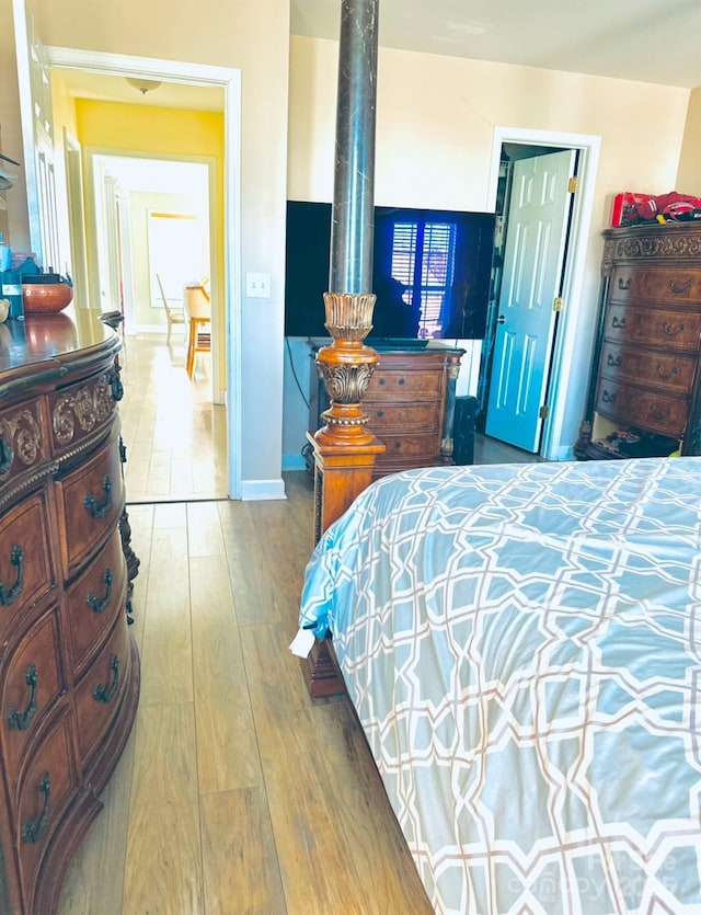 bedroom featuring hardwood / wood-style flooring