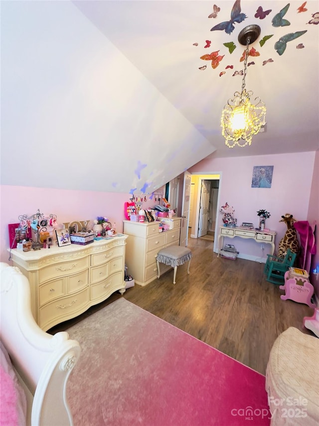 bedroom with lofted ceiling and dark wood-type flooring