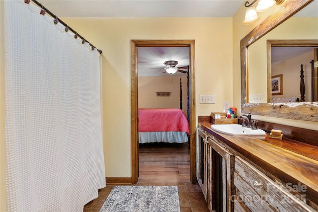 bathroom featuring vanity and ceiling fan