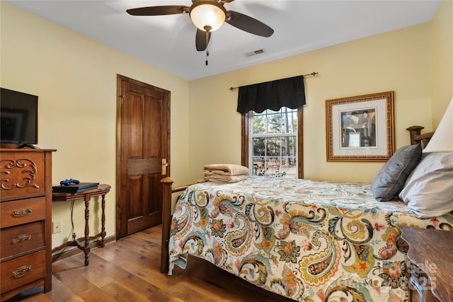 bedroom featuring ceiling fan and light wood-type flooring