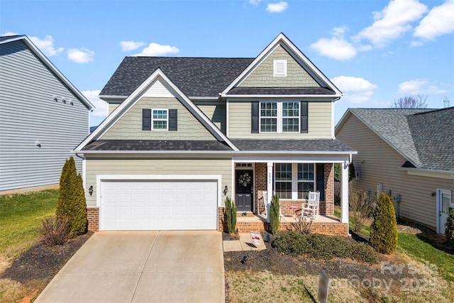 craftsman-style house with a garage and covered porch