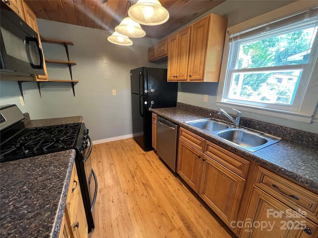 kitchen with pendant lighting, sink, wood ceiling, black appliances, and light hardwood / wood-style flooring