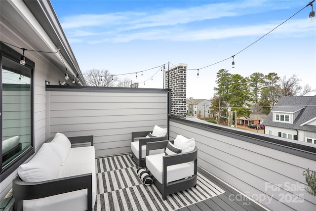 view of patio with a balcony