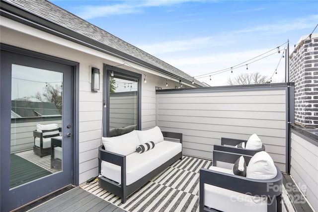 115 Verbena St NE Unit 12, Charlotte, NC 28217 - wooden deck featuring an outdoor hangout area