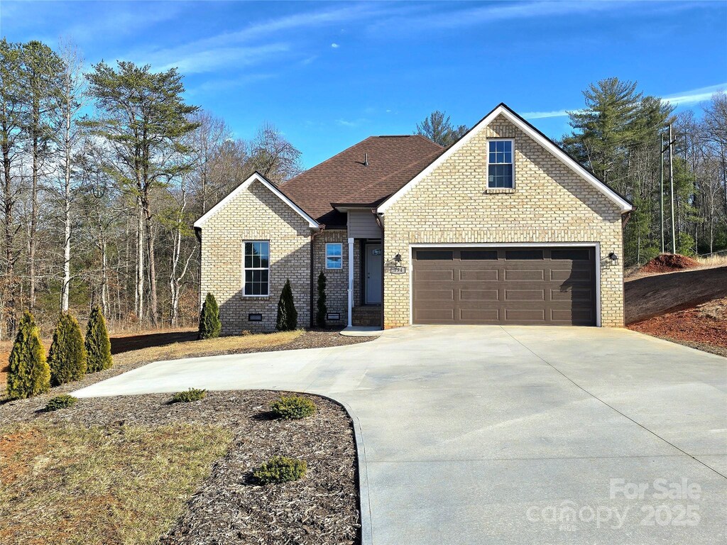 794 Harris Ave NW, Valdese, NC 28690 - front of property with a garage