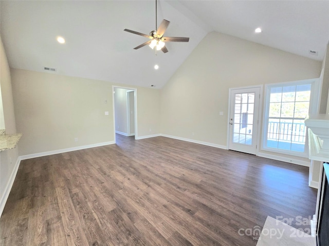 unfurnished living room with ceiling fan, dark hardwood / wood-style floors, and high vaulted ceiling