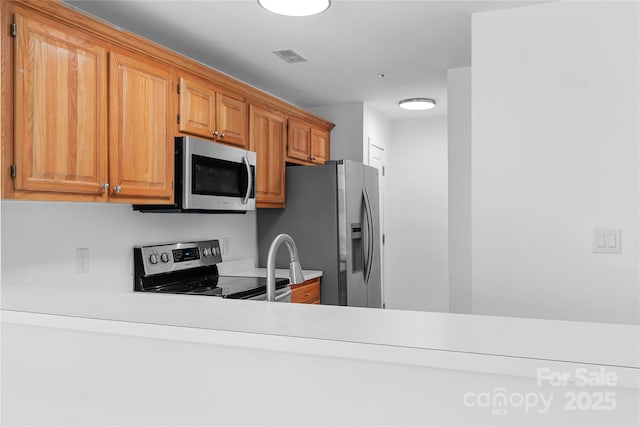 kitchen featuring appliances with stainless steel finishes