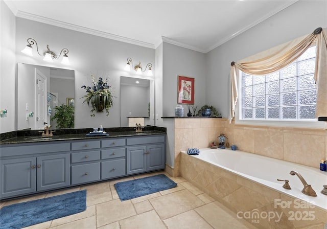 bathroom featuring crown molding, vanity, and a relaxing tiled tub