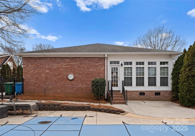 back of property with a patio area