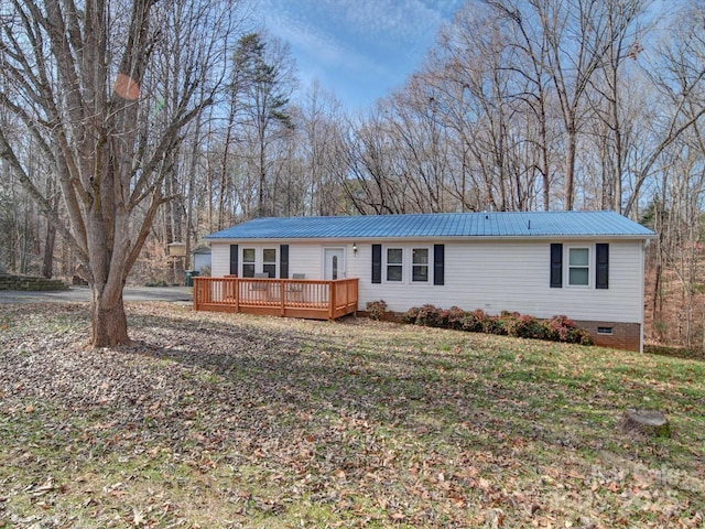 ranch-style home featuring a deck