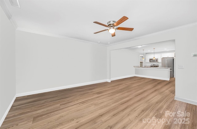 unfurnished living room with visible vents, baseboards, ceiling fan, ornamental molding, and light wood-type flooring