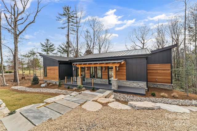 contemporary home with covered porch