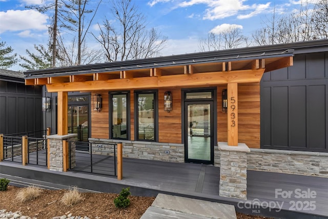 property entrance with a porch