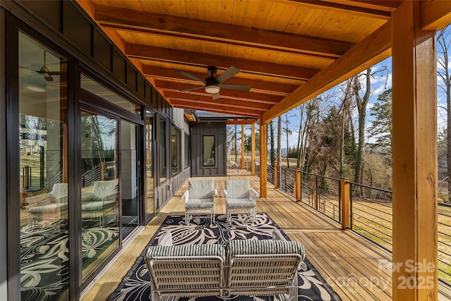 exterior space featuring ceiling fan